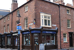 view of the corner entrance to the restored back to back houses near the centre of Birmingham